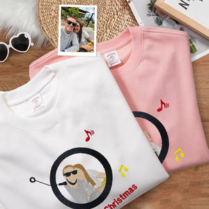 Custom embroidered sweatshirt with portrait and music player